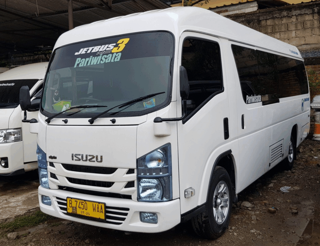 Sewa Elf Jakarta Bali, rental Elf Jakarta Bali, transportasi Jakarta Bali, perjalanan rombongan nyaman, sewa mobil Elf murah